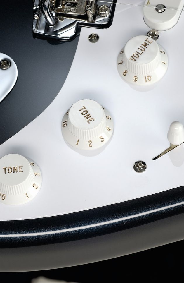 Mid boost and TBX tone controls.